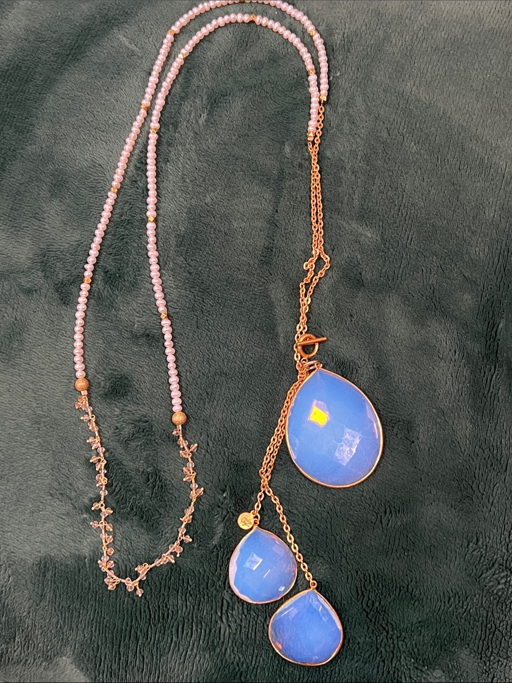 White Beaded Necklace with Blue Teardrop Pendant Accents